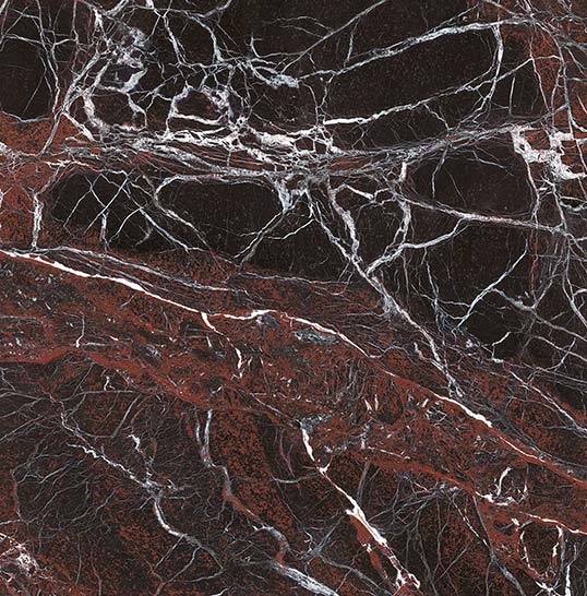 Détail de plaque céramique grand format à veinage marbré pour projet architectural haut de gamme