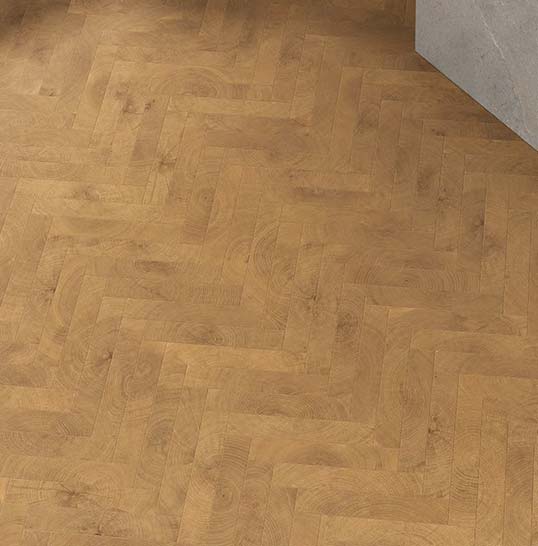 Carrelage effet bois chevrons au relief naturel Carrelage céramique effet bois posé en chevrons, relief naturel et texture chaleureuse