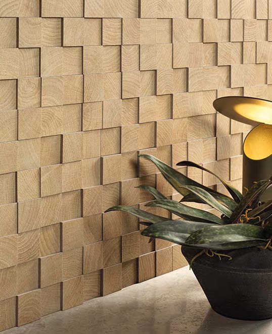 Mosaïque 3D Cube en céramique effet bois Mosaïque 3D Cube en céramique effet bois avec relief cubique créant un jeu d’ombres et de volumes architecturaux