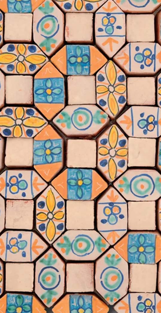 Motifs décoratifs artisanaux pour projets architecturaux Carreaux céramiques décorés à la main aux motifs méditerranéens illustrant le savoir-faire artisanal italien